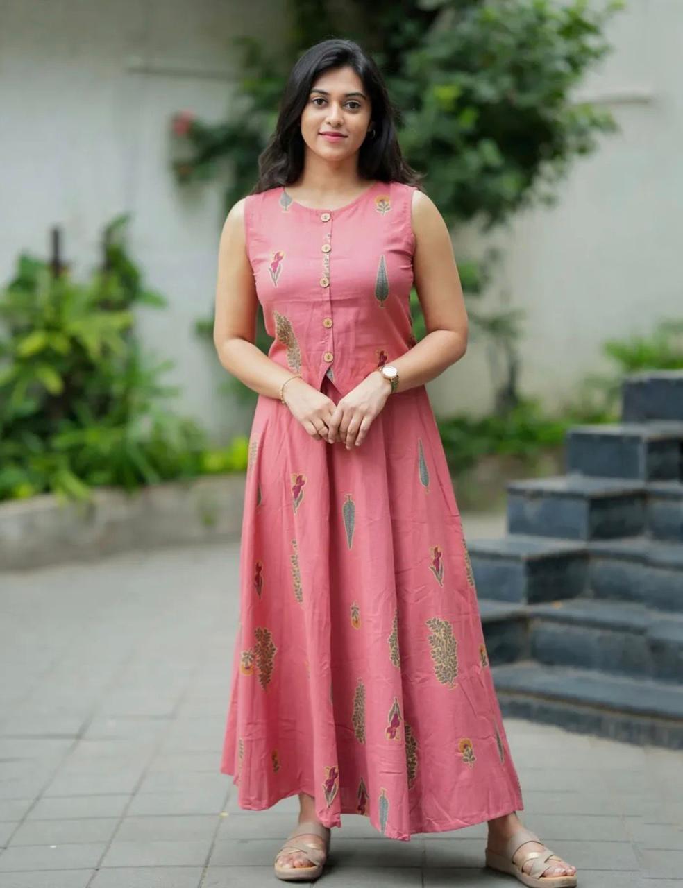 Roop contemporary ethnic co-ord set features a jacket-style sleeveless crop top paired with a gracefully flared maxi skirt.