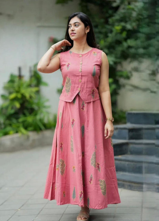 Roop contemporary ethnic co-ord set features a jacket-style sleeveless crop top paired with a gracefully flared maxi skirt.