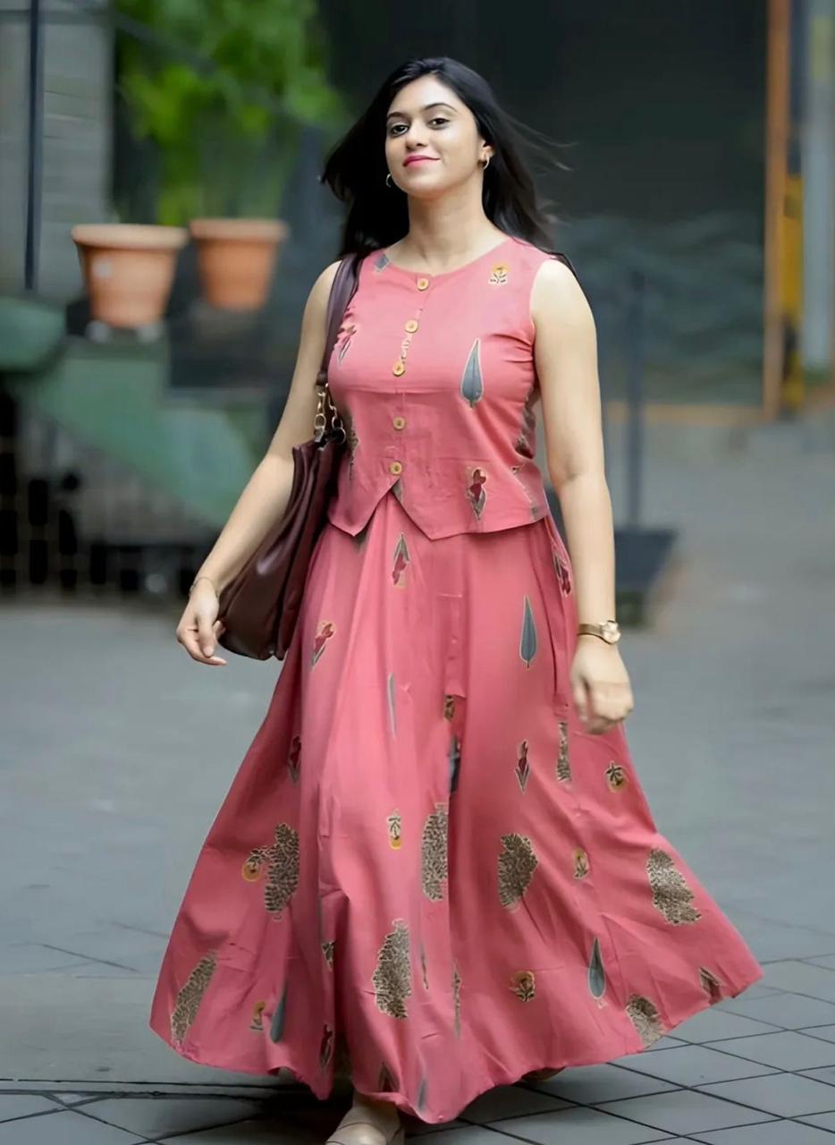 Roop contemporary ethnic co-ord set features a jacket-style sleeveless crop top paired with a gracefully flared maxi skirt.