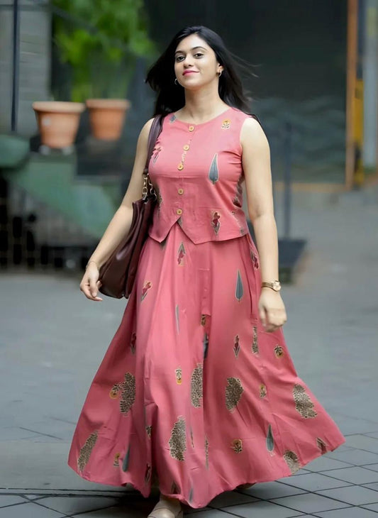 Roop contemporary ethnic co-ord set features a jacket-style sleeveless crop top paired with a gracefully flared maxi skirt.