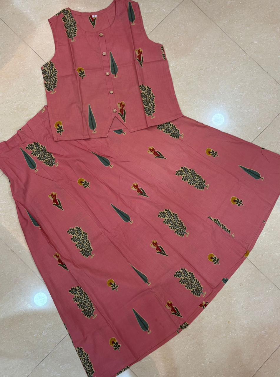 Roop contemporary ethnic co-ord set features a jacket-style sleeveless crop top paired with a gracefully flared maxi skirt.